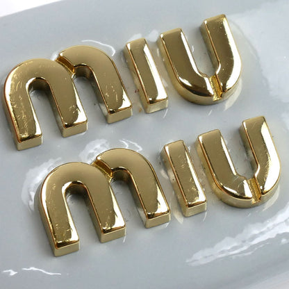 MIUMIU ミュウミュウ パテントレザー ヘアクリップ バレッタ 5IF092 レディース【中古】【美品】